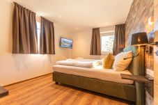 Ferienwohnung in Zell am See - Tevini Boutique Suites - Apartment Earth